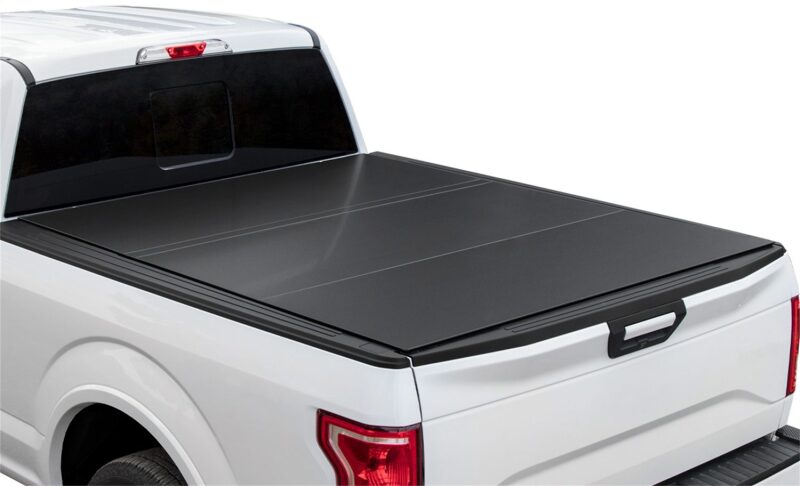 Access LOMAX Tri-Fold Tonneau Cover for 2022+ Rivian R1T 4 ft 6 in Bed with OEM Tonneau Track, Matte Black - accB1080019
