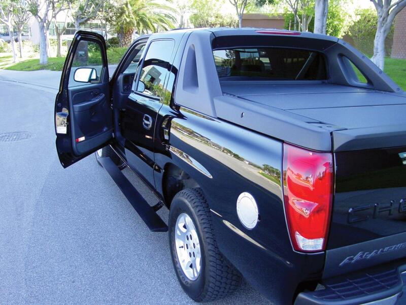 AMP Research PowerStep Automatic Running Boards, Black - Part Number 75125-01A