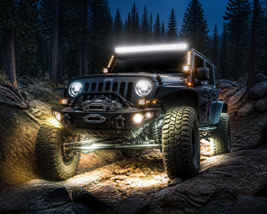 Jeep Wrangler off-road lighting setup in Flagstaff forest trail