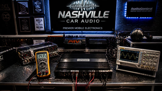 Professional car audio amplifier tuning workbench in Nashville workshop