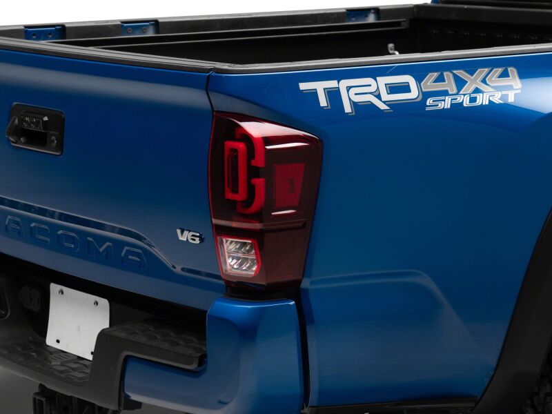 Raxiom Toyota Tacoma 2016-2023 XW Series Sequential LED Tail Lights with Black Housing and Red Lens