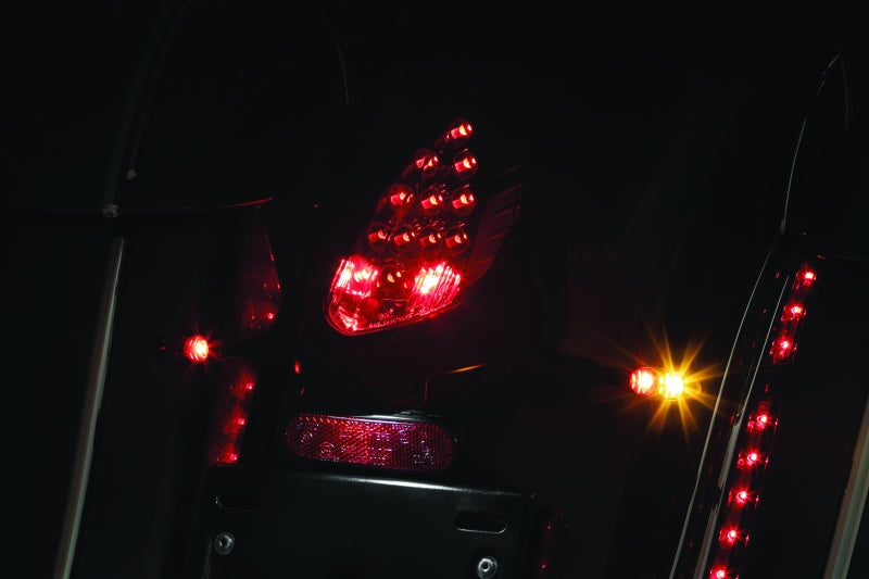 Kuryakyn Micro 1000 Dual-Function LED Turn Signals, Smoke Lens, Red/Red/Amber, Satin Black – Part Number 2534