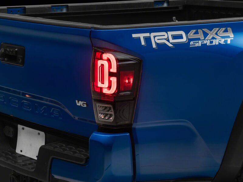 Raxiom 16-23 Toyota Tacoma XW Series Sequential LED Tail Lights with Black Housing and Clear Lens
