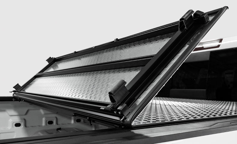 Access LOMAX Hard Tri-Fold Tonneau Cover accB2030059 for 2022–2023 Nissan Frontier 5-Foot Bed, Diamond Plate