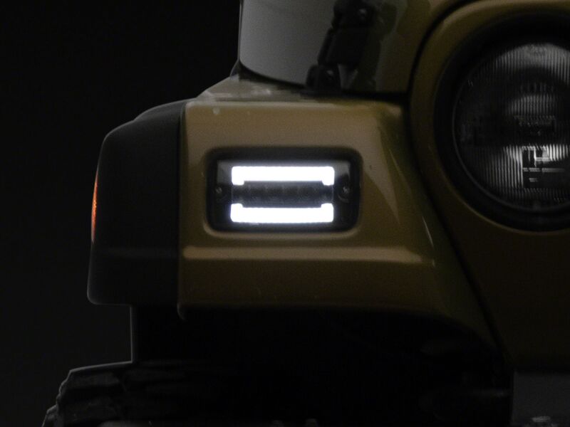 Raxiom 97-06 Jeep Wrangler TJ Axial Series Smoked LED Sequential Cornering Lights