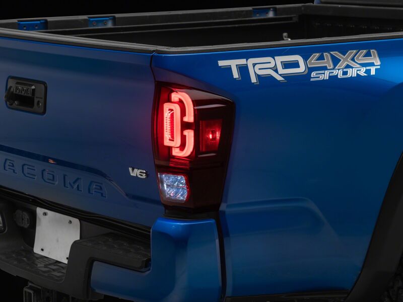 Raxiom Toyota Tacoma 2016-2023 XW Series Sequential LED Tail Lights with Black Housing and Red Lens