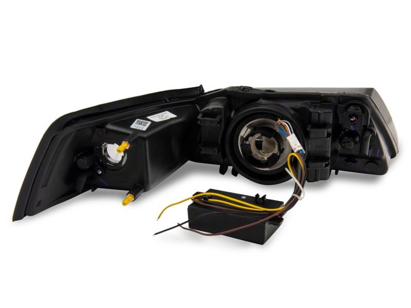 Raxiom Axial Series Headlights with Sequential LED Bar for 1999-2004 Ford Mustang, Black Housing, Clear Lens