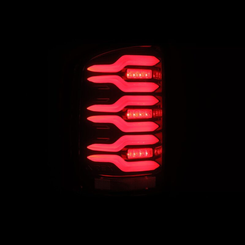 AlphaRex LUXX-Series LED Tail Lights for 2014-2018 GMC Sierra 1500, 2500HD and 3500HD, Black/Red with Active Light Sequence Signal - ARX630050