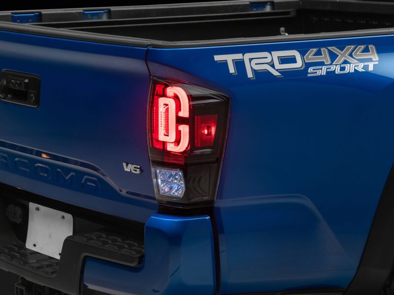 Raxiom 16-23 Toyota Tacoma XW Series Sequential LED Tail Lights with Black Housing and Clear Lens