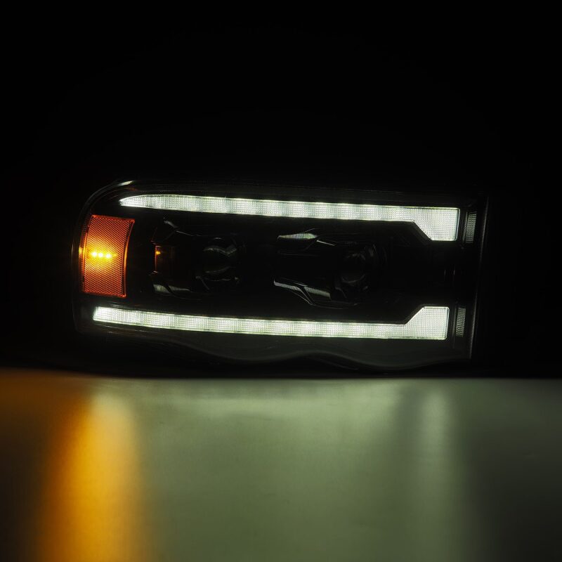 AlphaRex PRO-Series Projector Headlights for 2002–2005 Dodge Ram 1500, Plank Style Alpha Black, ARX880572