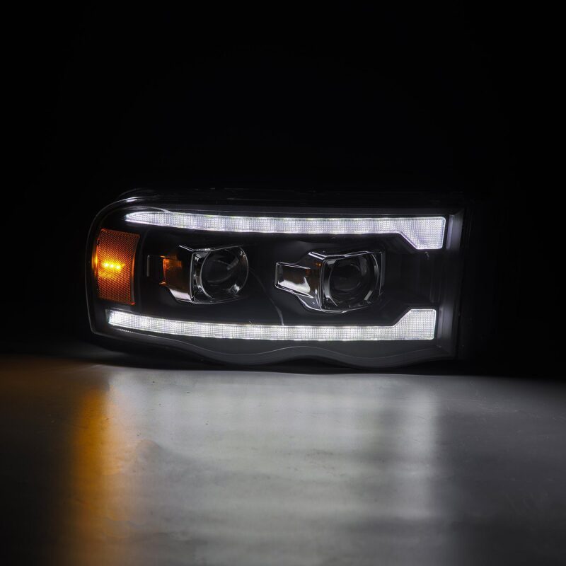 AlphaRex LUXX-Series Projector Headlights for 2002-2005 Dodge Ram 1500, Plank Style Black, Part Number ARX880567