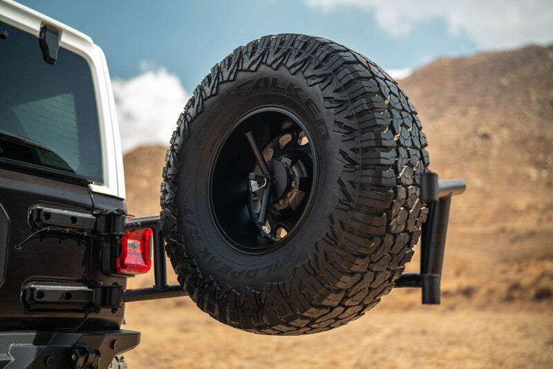 DV8 Offroad Body Mounted Tire Carrier for 2018–2025 Jeep Wrangler JL, Part Number dveTCJL-14