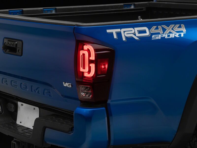 Raxiom Toyota Tacoma 2016-2023 XW Series Sequential LED Tail Lights with Black Housing and Red Lens