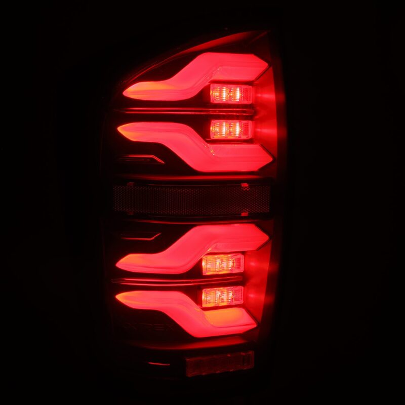 AlphaRex LUXX LED Taillights for 2016–2021 Toyota Tacoma, Black Housing, Activ Light and Sequential Signals – ARX680090
