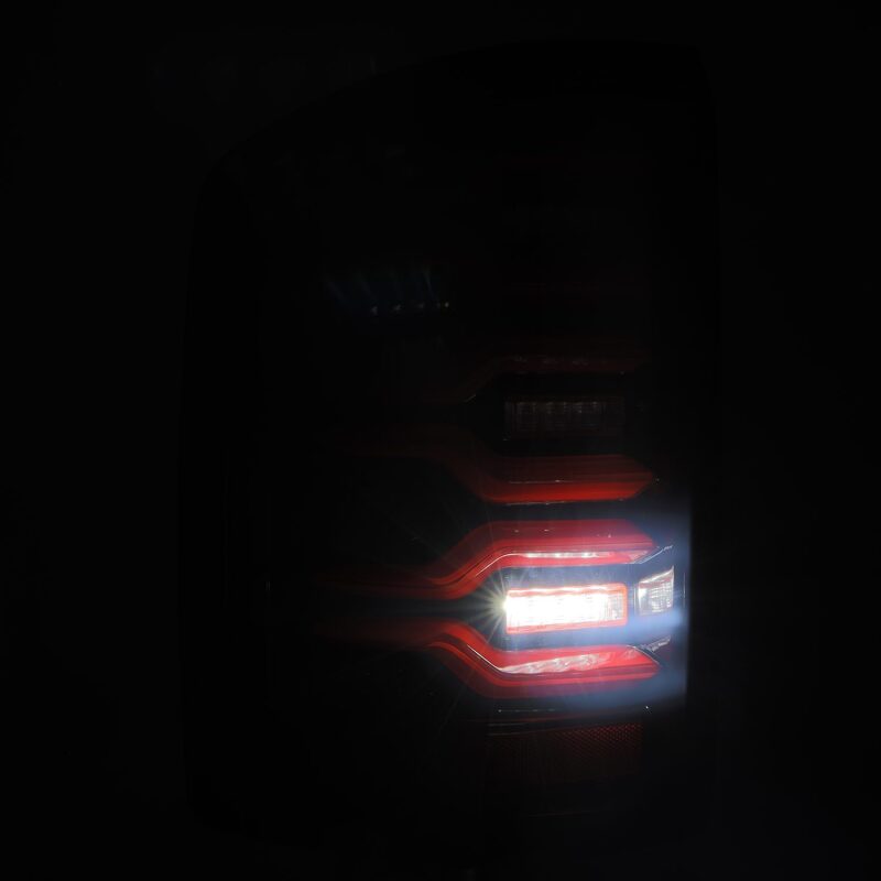 AlphaRex LUXX-Series LED Tail Lights for 2014-2018 GMC Sierra 1500, 2500HD and 3500HD, Black/Red with Active Light Sequence Signal - ARX630050