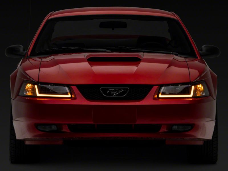 Raxiom Axial Series Headlights with Sequential LED Bar for 1999-2004 Ford Mustang, Black Housing, Clear Lens