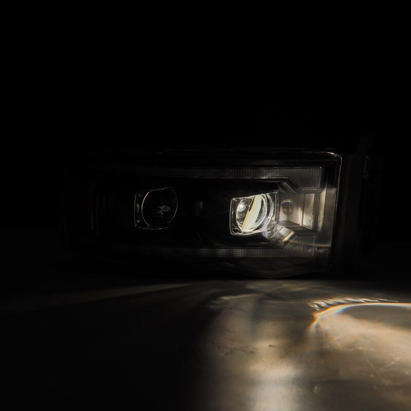 AlphaRex LUXX-Series Projector Headlights for 2002-2005 Dodge Ram 1500, Plank Style Black, Part Number ARX880567