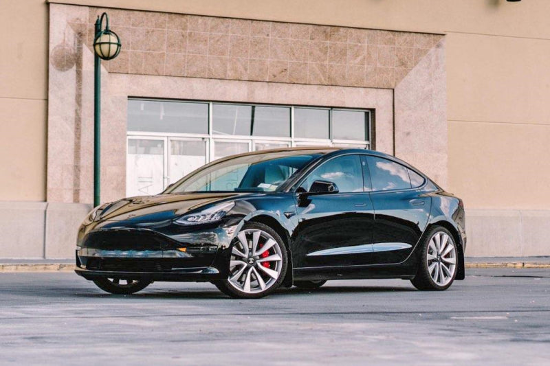 Rally Armor - ralMF62-UR-BLK/WH - 2017-2023 Tesla Model 3 Black UR Mud Flaps with White Logo