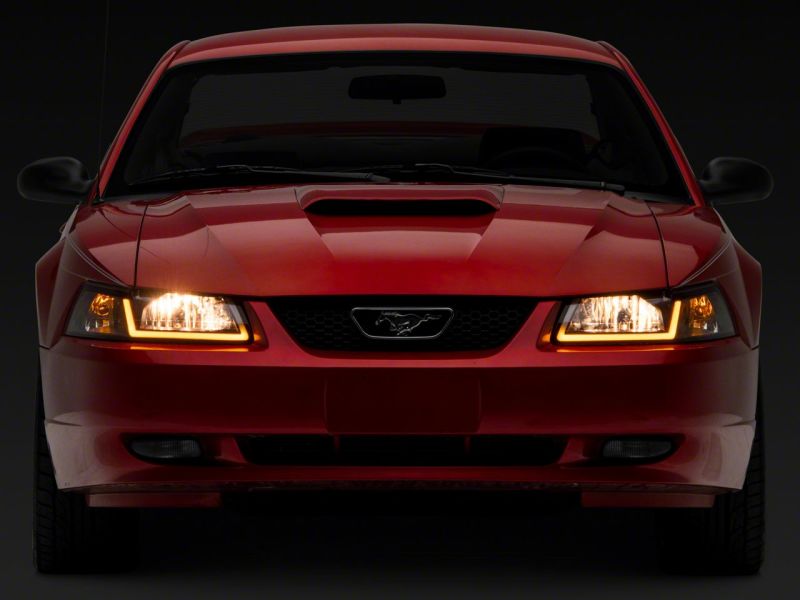 Raxiom Axial Series Headlights with Sequential LED Bar for 1999-2004 Ford Mustang, Black Housing, Clear Lens